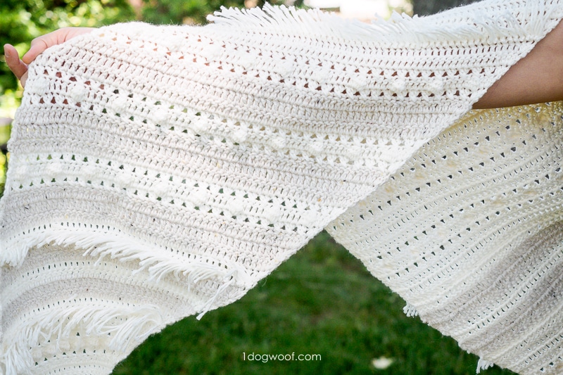 close-up of fringe, eyelets and bobbles in crochet shawl