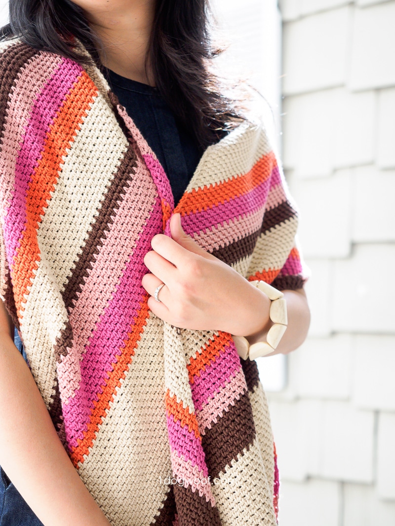 diagonal striped crochet shawl around shoulders